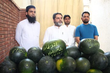 JI politician distributes watermelons